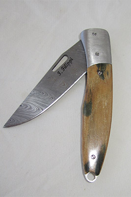 Coltello 115